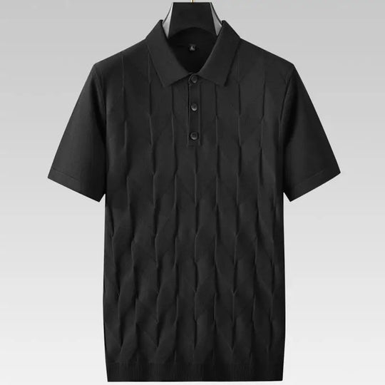 Black polo shirt on a gray background