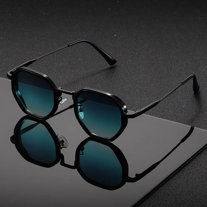 Black sunglasses with blue-tinted lenses on a reflective black surface