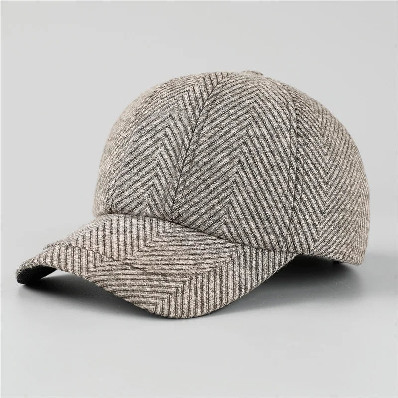 Herringbone patterned cap on a light gray background