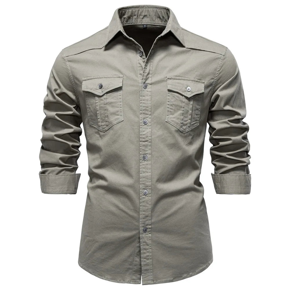 Light gray button-up shirt with rolled-up sleeves on a white background