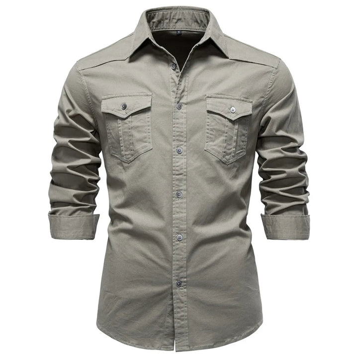 Light gray button-up shirt with rolled-up sleeves on a white background