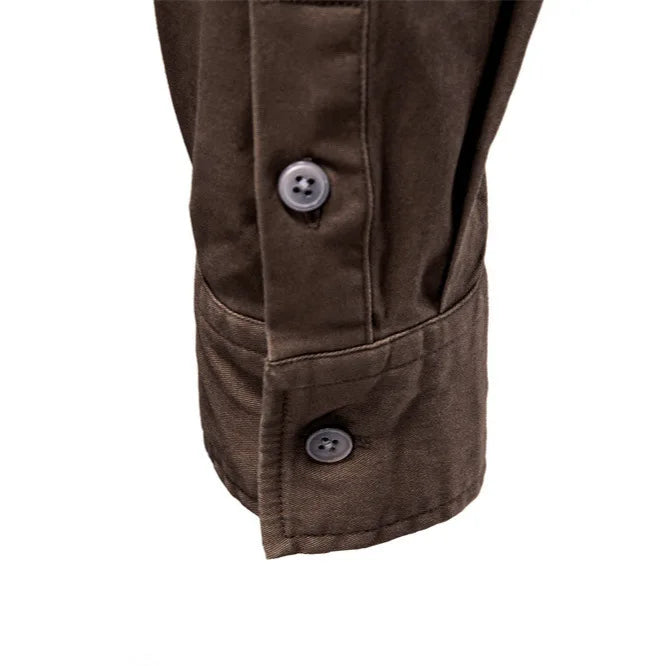Close-up of a brown jacket with button details on a white background