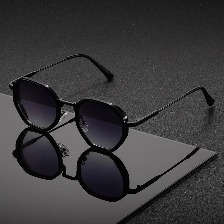 Black sunglasses with a reflective surface on a dark background