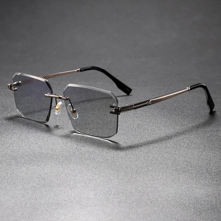 Sleek, rimless eyeglasses on a gray background