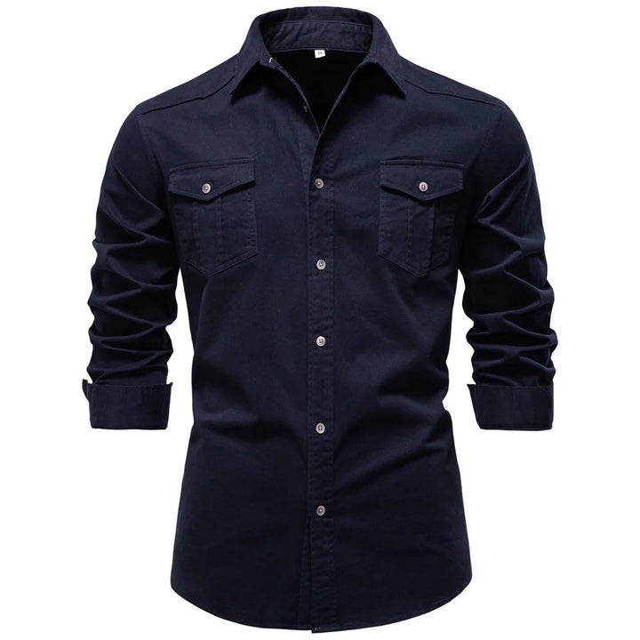 Navy blue shirt with two front pockets on a white background