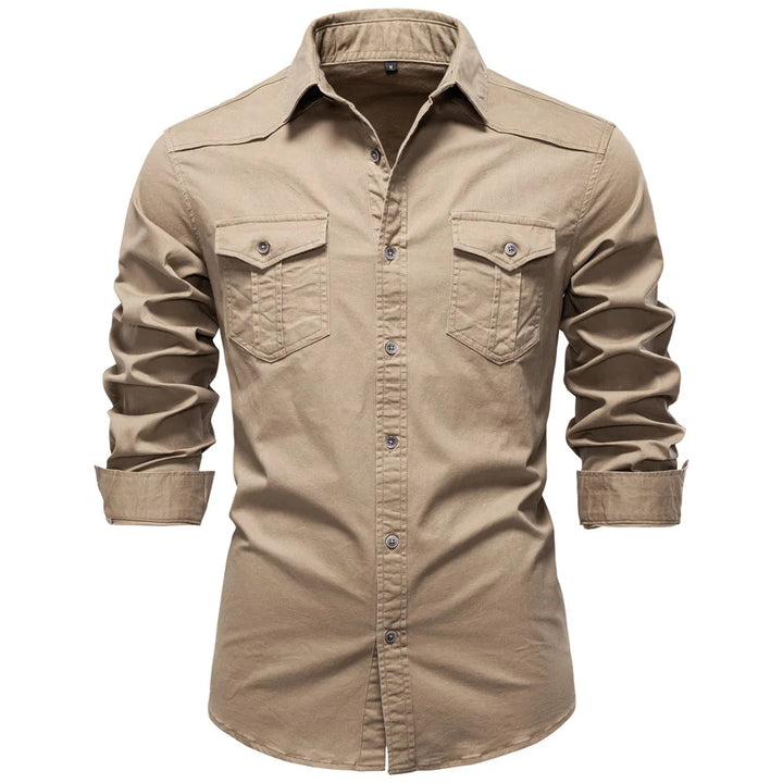 Beige button-up shirt with rolled-up sleeves on a white background