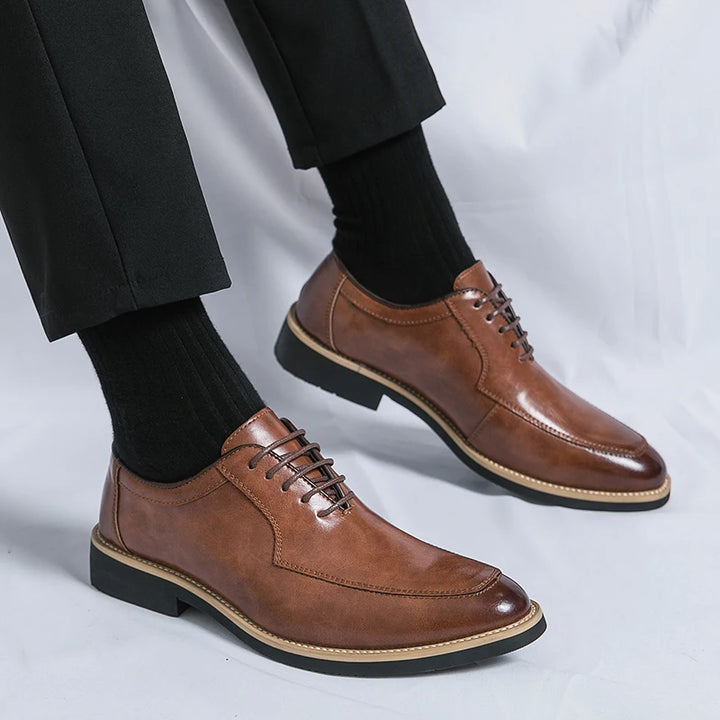 Men's leather formal shoes with polished lace-up profile