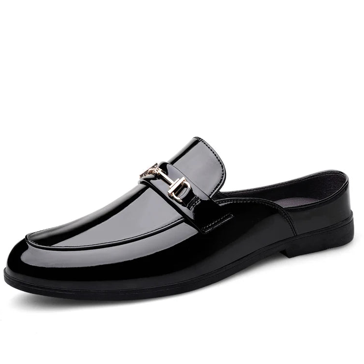 Black glossy loafer shoe on a white background