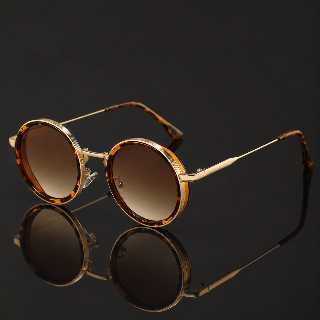 Round sunglasses with tortoiseshell frame and brown lenses on a reflective black surface.