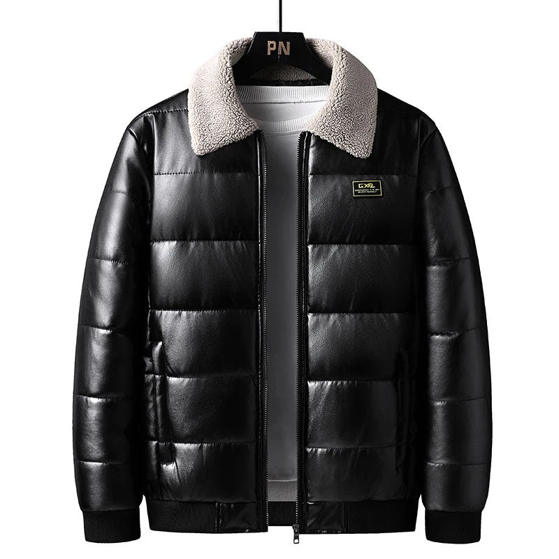 A black hybrid leather thermal jacket with a quilted insulation and a plush sherpa-lined collar. It features ribbed cuffs and hem, and a front zipper closure.