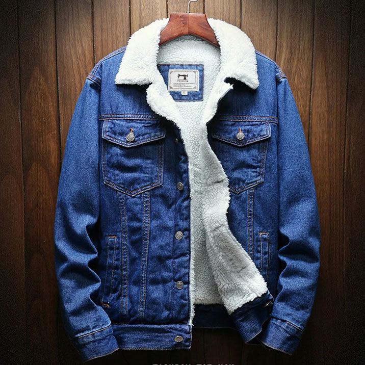 A blue denim jacket with a white collar and a wool-lined hood, displayed on a wooden hanger.