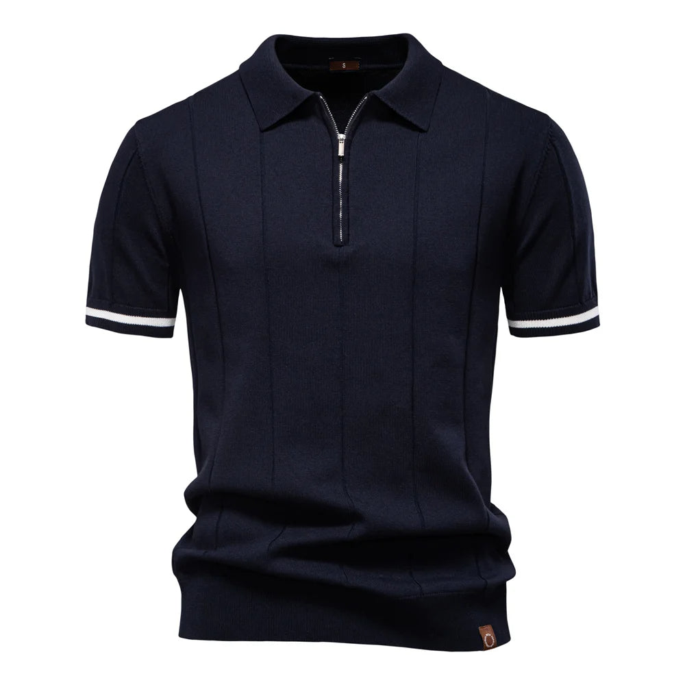 Navy blue polo shirt with white trim on a white background