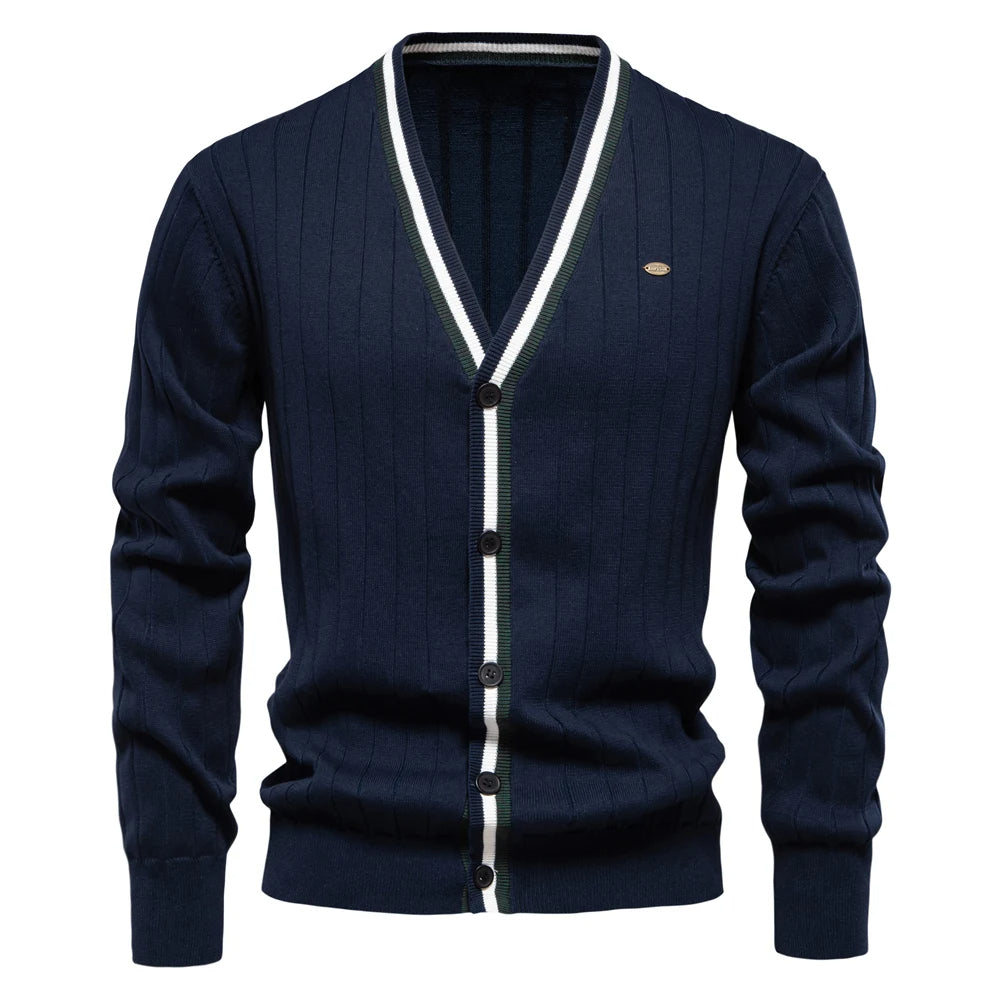 A navy blue V-neck knit cardigan with button-up style and contrast trim.